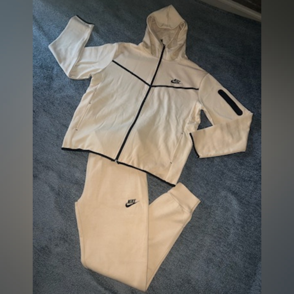 Tan and black Nike sweatsuit